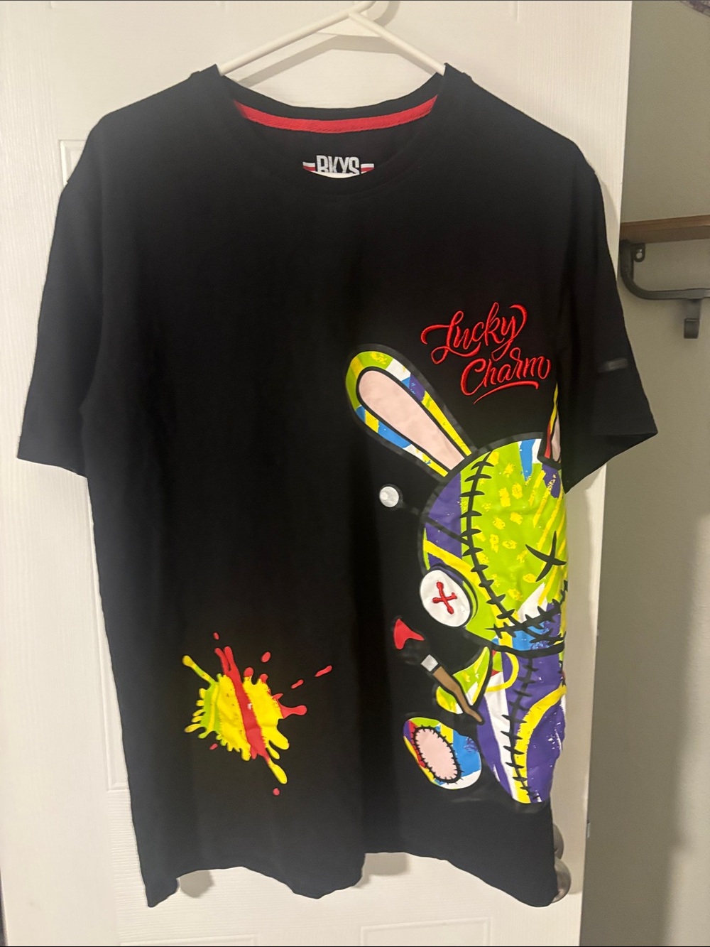 "Lucky Charm" Black Graphic Tee with Multicolor Bunny Sz L